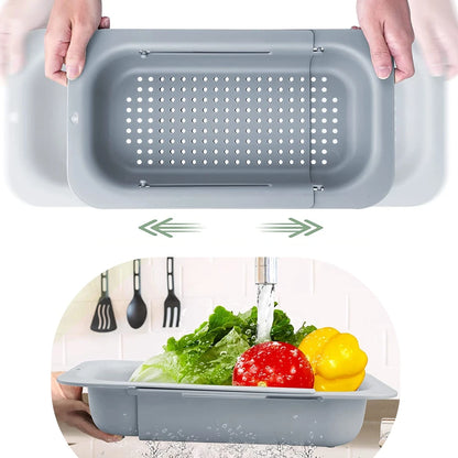 Colander draining pasta over kitchen sink