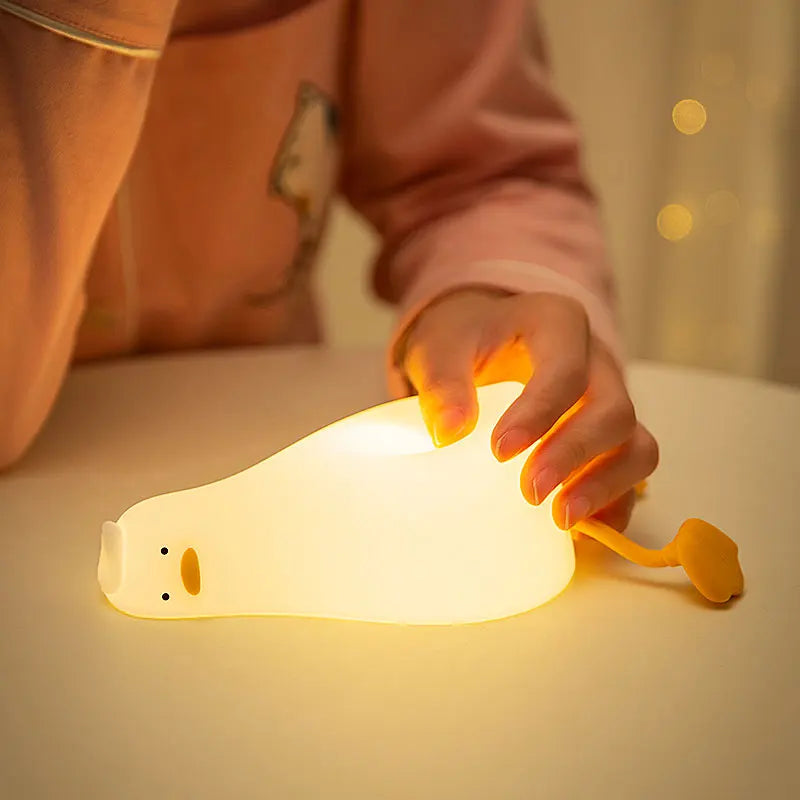 Duck night light style E on kids shelf